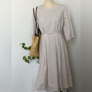 Stevie Hender Rose pleated dress.